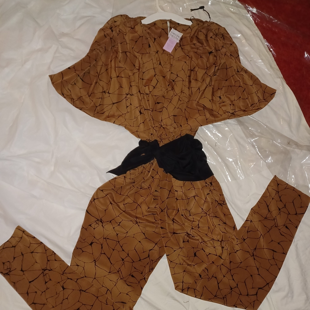 Beautiful One Piece Jumpsuit by "BarBara Barbara" Never Worn W/ tags size 7/8